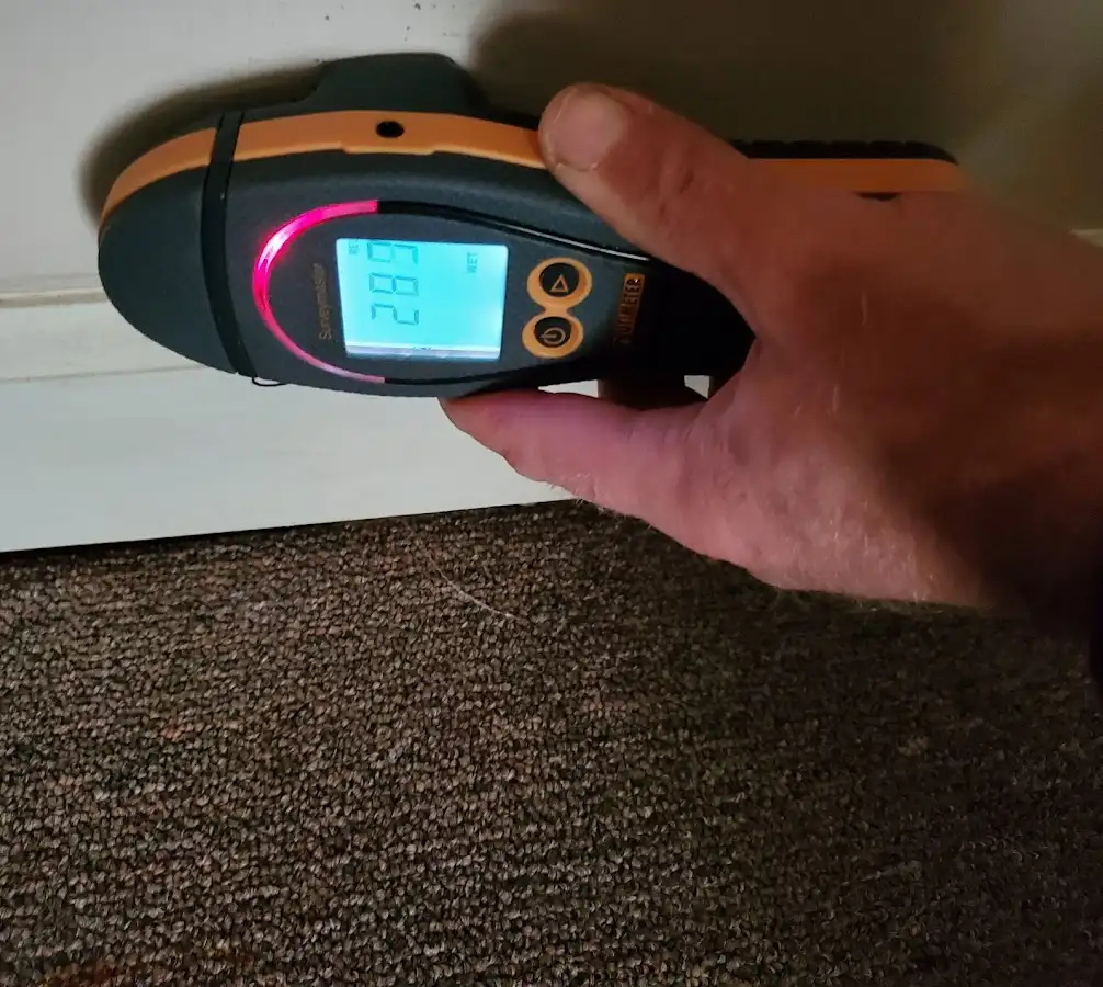 Moisture detection at baseboard during Burst Pipe Cleanup in St. Simons